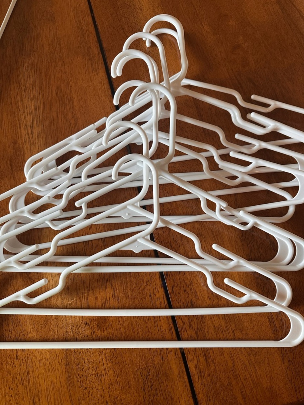 Upgrade your closet with all matching sturdy white hangers 10ct
